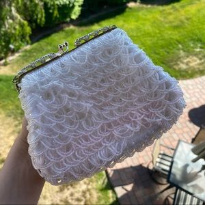 Small white stringed gem bag